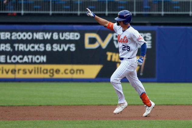 Jared Young of the Syracuse Mets rounds the bases