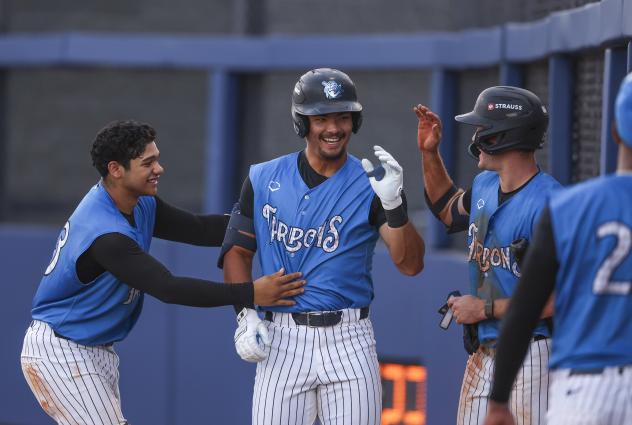 Tampa Tarpons all smiles after scoring yet again