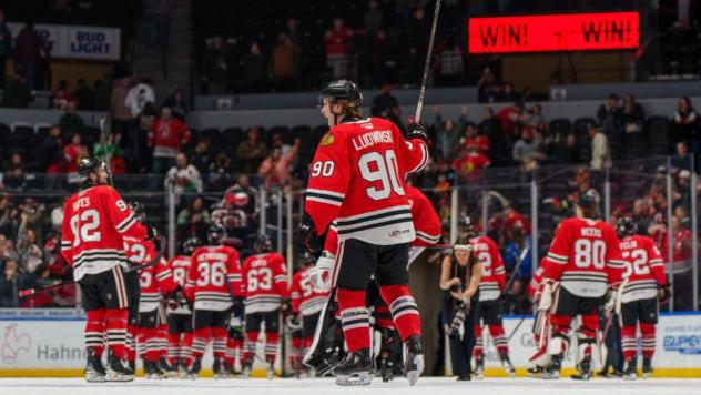 Rockford IceHogs salute their fans after a win