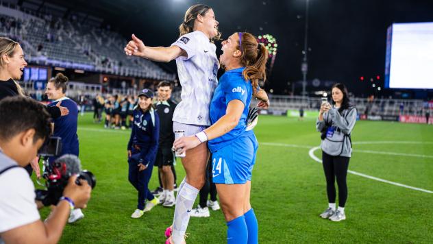 Racing Louisville FC exchange chest bumps