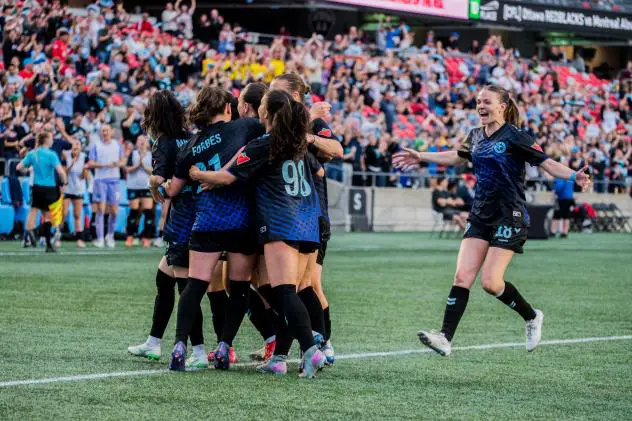 Ottawa Rapid FC celebrates a goal against Vancouver Rise FC