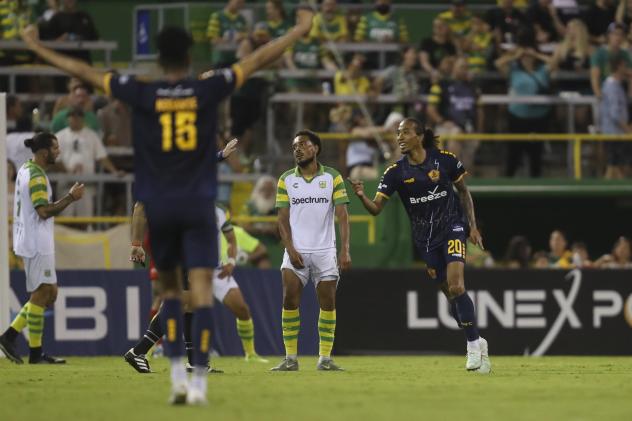 Rhode Island FC react after a goal against the Tampa Bay Rowdies