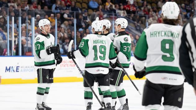 Texas Stars gather after a goal against the Milwaukee Admirals