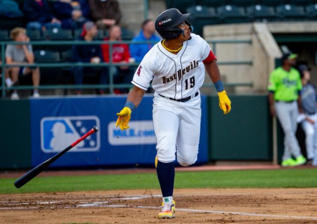 Tri-City Dust Devils outfielder Randy De Jesus watches his home run