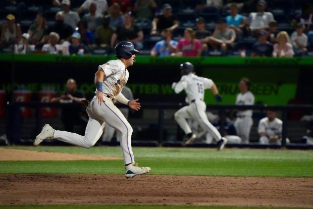 Pensacola Blue Wahoos run the bases