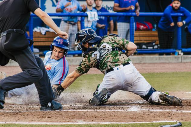 Biloxi Shuckers catcher Darrien Miller applies the tag against the Knoxville Smokies