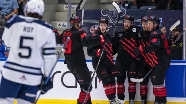 Moncton Wildcats gather following a goal against the Rimouski Oceanic