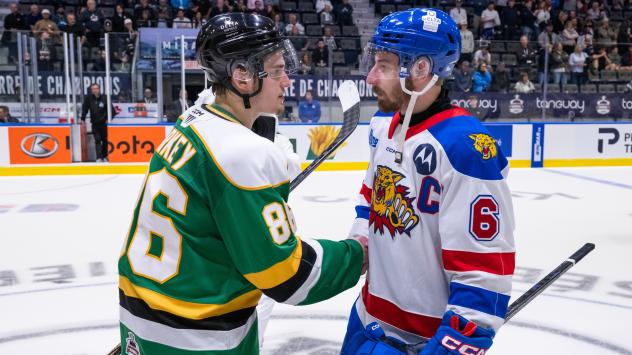 London Knights left wing Denver Barkey shakes hands with Moncton Wildcats centre Markus Vidicek