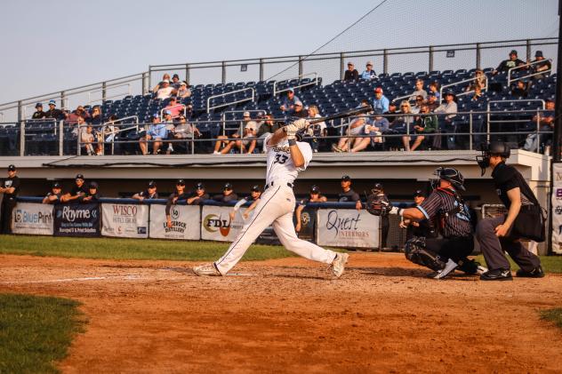 Fond du Lac Dock Spiders catcher Sam Pease at the plate