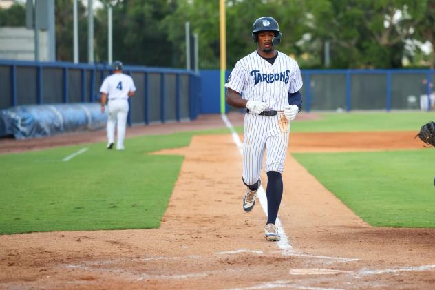 Dillion Lewis of the Tampa Tarpons heads home after hitting a homer