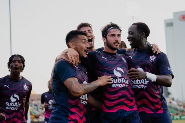 South Georgia Tormenta FC congratulate Sebastián Vivas on his goal