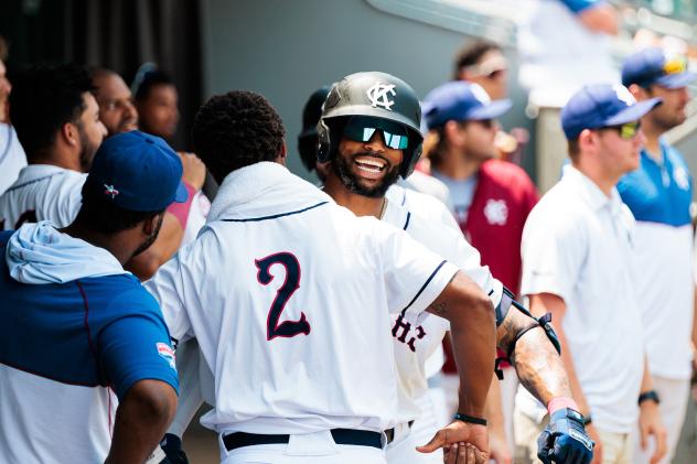 Isiah Gilliam is greeted by Kansas City Monarchs teammate Jaylyn Williams (#2)
