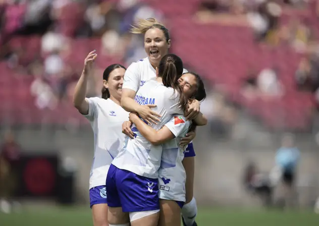 Ottawa Rapid FC celebrates a goal by forward Delaney Baie Pridham