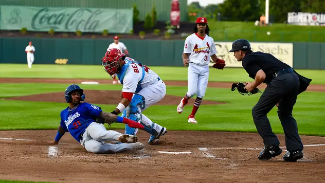 Jose Ramos of the Tulsa Drillers is tagged out at home plate