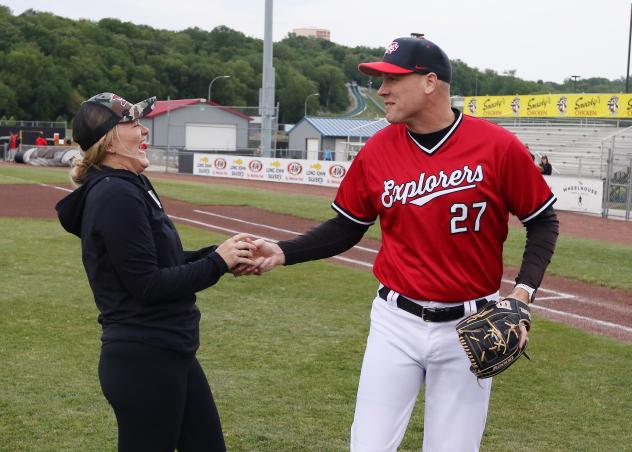 Sioux City Explorers pitcher J.D. Scholten greets a fan