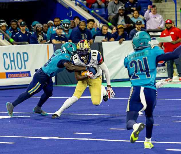 Massachusetts Pirates make a tackle vs. the Quad City Steamwheelers