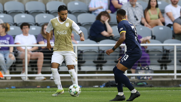 Birmingham Legion FC's Erik Centeno and Louisville City FC's Amadou Dia in action