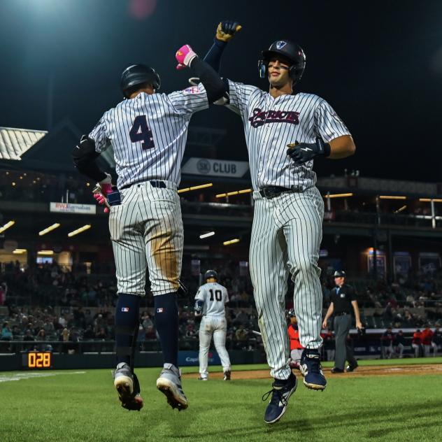 Spencer Jones of the Somerset Patriots following a home run