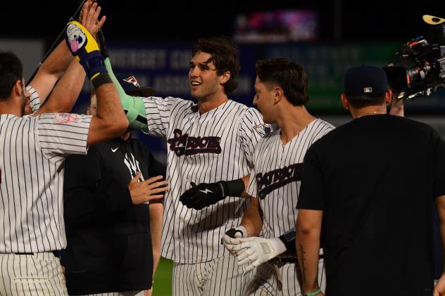 Spencer Jones of the Somerset Patriots receives high fives