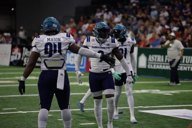 Massachusetts Pirates defensive lineman Matt Mason and defensive back/linebacker Marquis Waters
