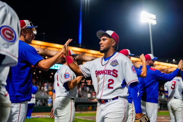 Knoxville Smokies shortstop Pedro Ramirez exchanges high fives