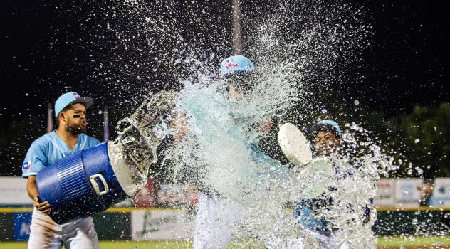 Hickory Crawdads celebrate a victory