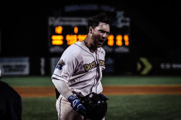 Nate McHugh of the Fond du Lac Dock Spiders reacts after his walk-off home run