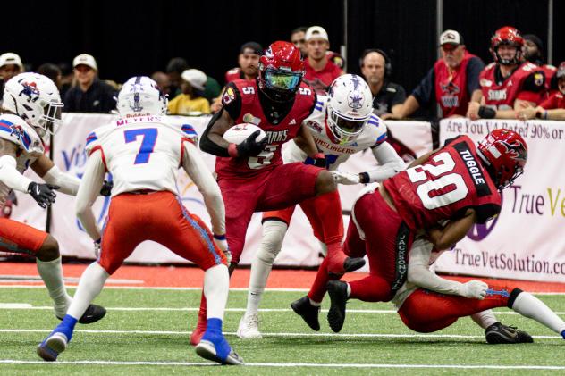 Jacksonville Sharks running back Larry McCammon carries against the San Antonio Gunslingers