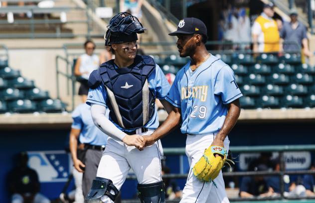 Charleston RiverDogs pitcher Jose Urbina and catcher Nathan Flewelling