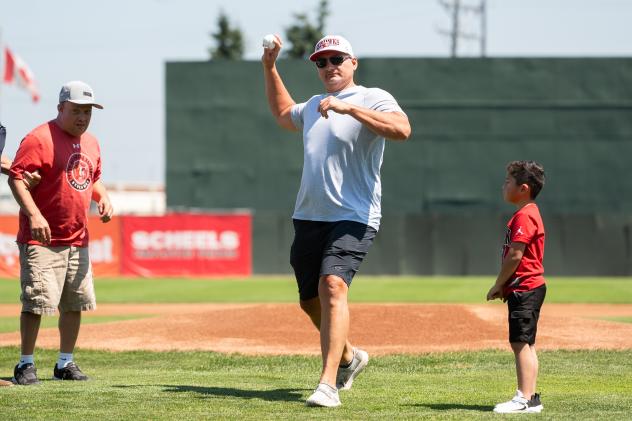 Jeremy Dirksen throws out the first pitch at the Fargo-Moorhead RedHawks game