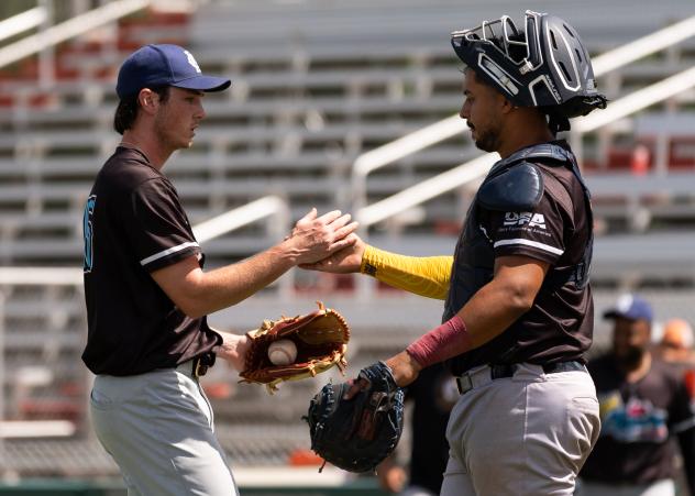 Kansas City Monarchs pitcher Hunter McMahon and catcher Joshuan Sandoval
