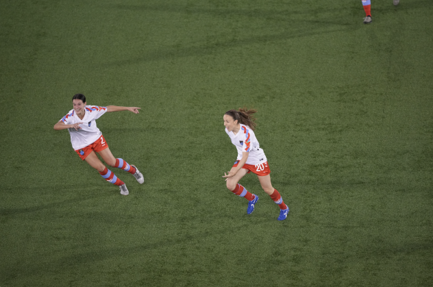 Montreal Roses react after a goal