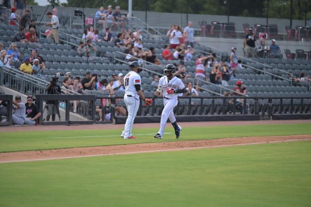 Reylin Perez of the Fayetteville Woodpeckers rounds the bases