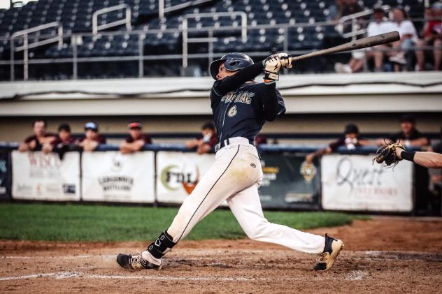 Taylor Freeman takes a big swing for the Fond du Lac Dock Spiders