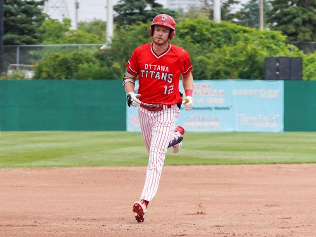 Ottawa Titans utility player Taylor Wright rounds the bases