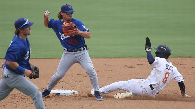 Taylor Young of the Tulsa Drillers turns a double play