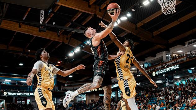 Vancouver Bandits forward Mitch Creek drives to the basket