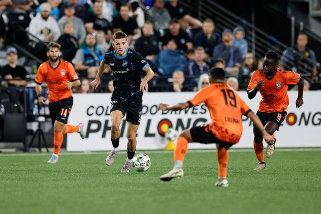 Colorado Springs Switchbacks FC's Quenzi Huerman versus Orange County SC's Kevin Partida