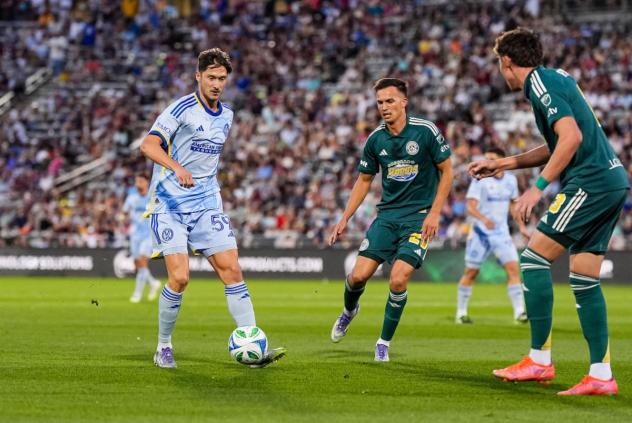 Atlanta United's Alexey Miranchuk and Colorado Rapids' Cole Bassett and Sam Vines on the field