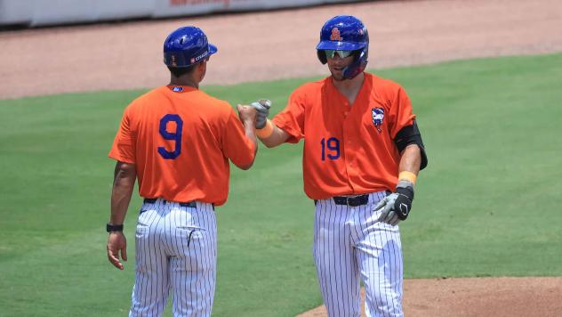St. Lucie Mets Manager Luis Rivera (left) and left fielder John Bay