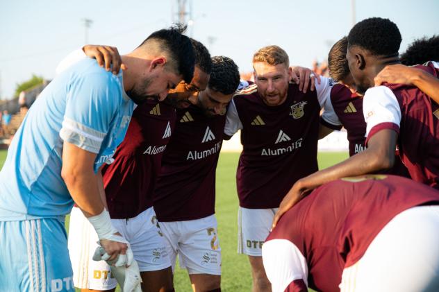 Detroit City FC huddle