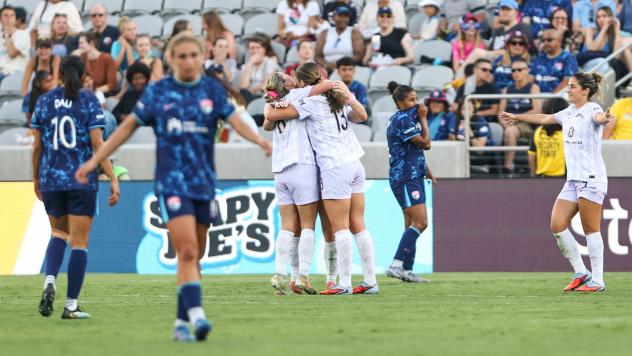 Racing Louisville FC congratulates Emma Sears after her goal