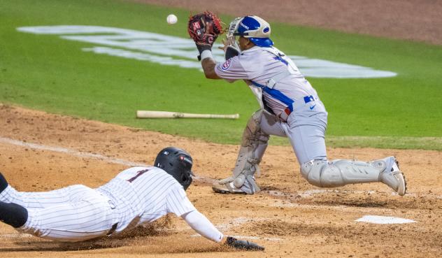 Knoxville Smokies catcher Pablo Aliendo prepares to make a play at the plate