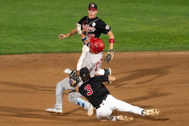 Fargo-Moorhead RedHawks infielder Aidan Byrne tags out a Winnipeg Goldeyes baserunner