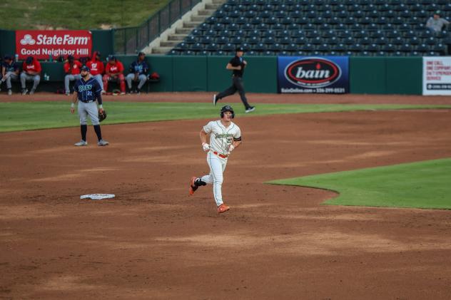 Greensboro Grasshoppers designated hitter Titus Dumitu rounds the bases