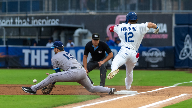 Zach Ehrhard of the Tulsa Drillers races to first