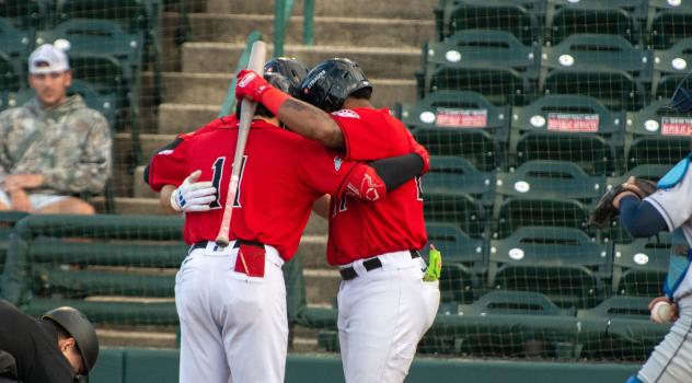 Hickory Crawdads celebrate after scoring