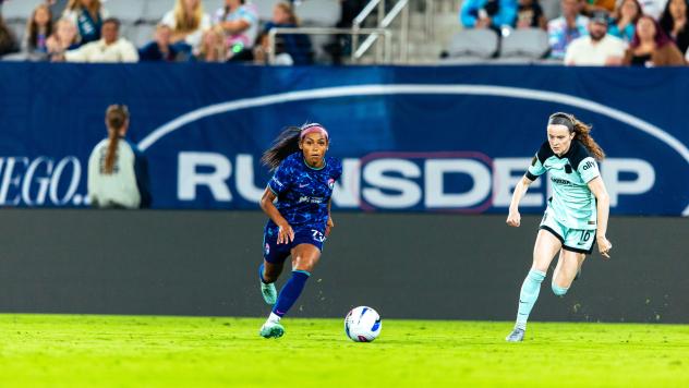 San Diego Wave FC's Perle Morroni and Gotham FC's Rose Lavelle on the field