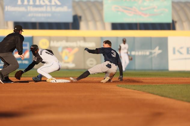 Brendan Jones of the Somerset Patriots slides into second