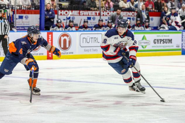 Flint Firebirds' Bryson Morgan battles Saginaw Spirit's Ryan Hanrahan